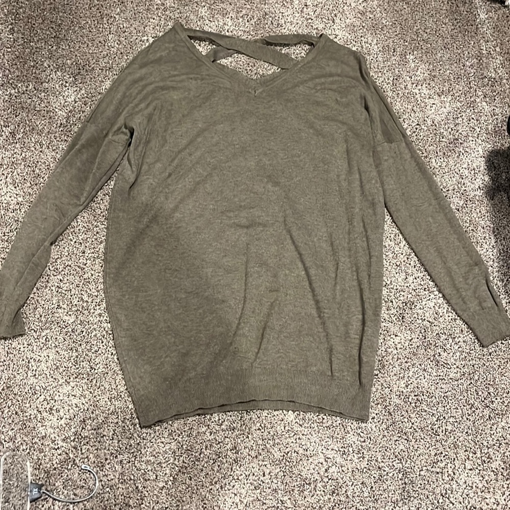 Dreamers Oversized/long sweater size S/M with criss-cross back.